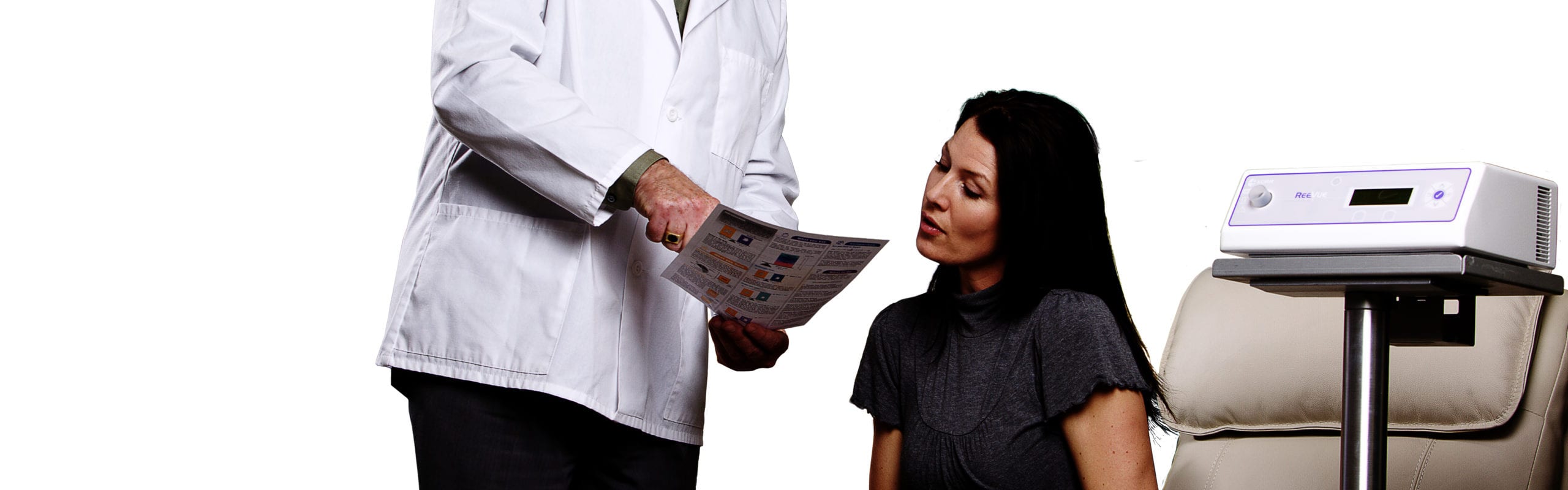 Doctor instructing patient with a form